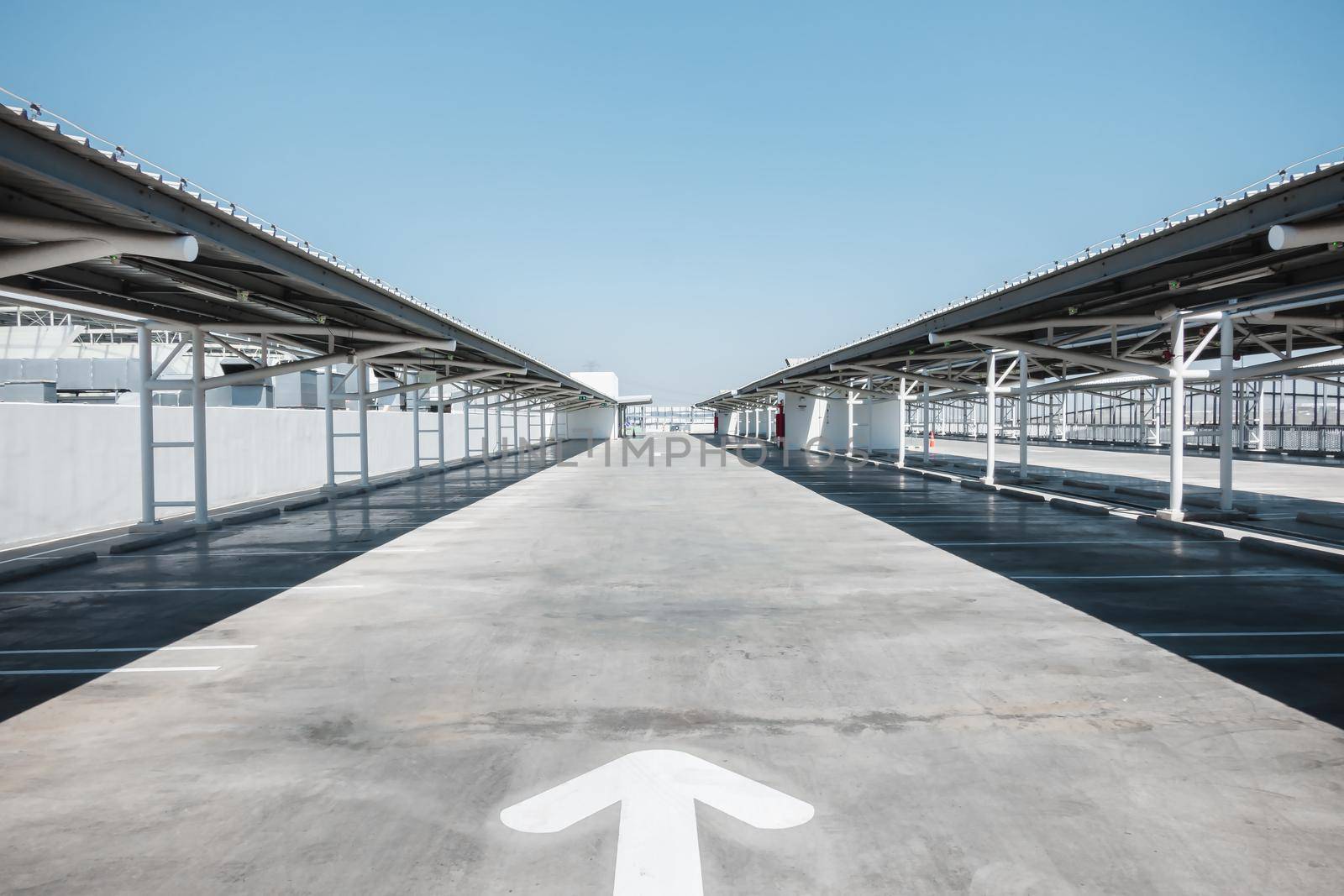 Car Parking Lot Area on Deck Floor of Shopping Mall, Perspective View Empty of Car Park Structure Building at Department Store. Auto Service Parking Lots