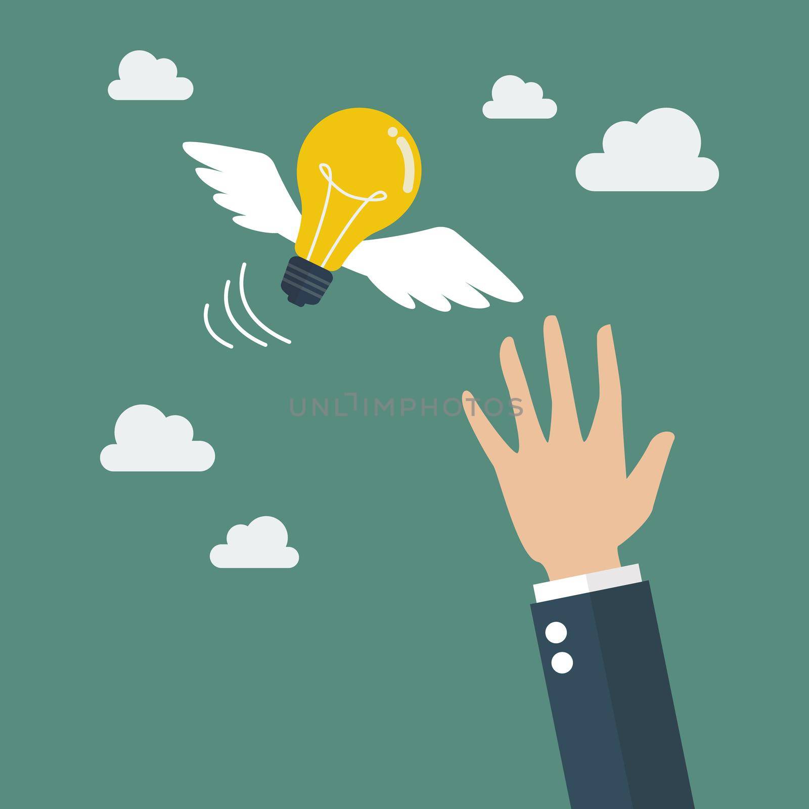 Hand catching a light bulb fly. Business concept
