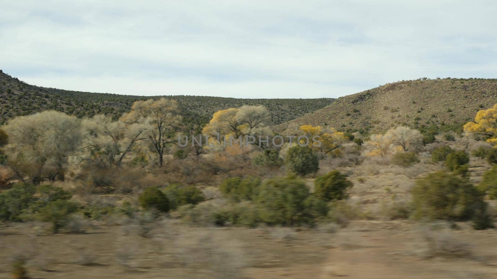 Road trip from Grand Canyon, Arizona USA. Driving auto, route to Las Vegas, Nevada. Hitchhiking traveling in America, local journey, wild west calm atmosphere, indian lands. Wilderness thru car window