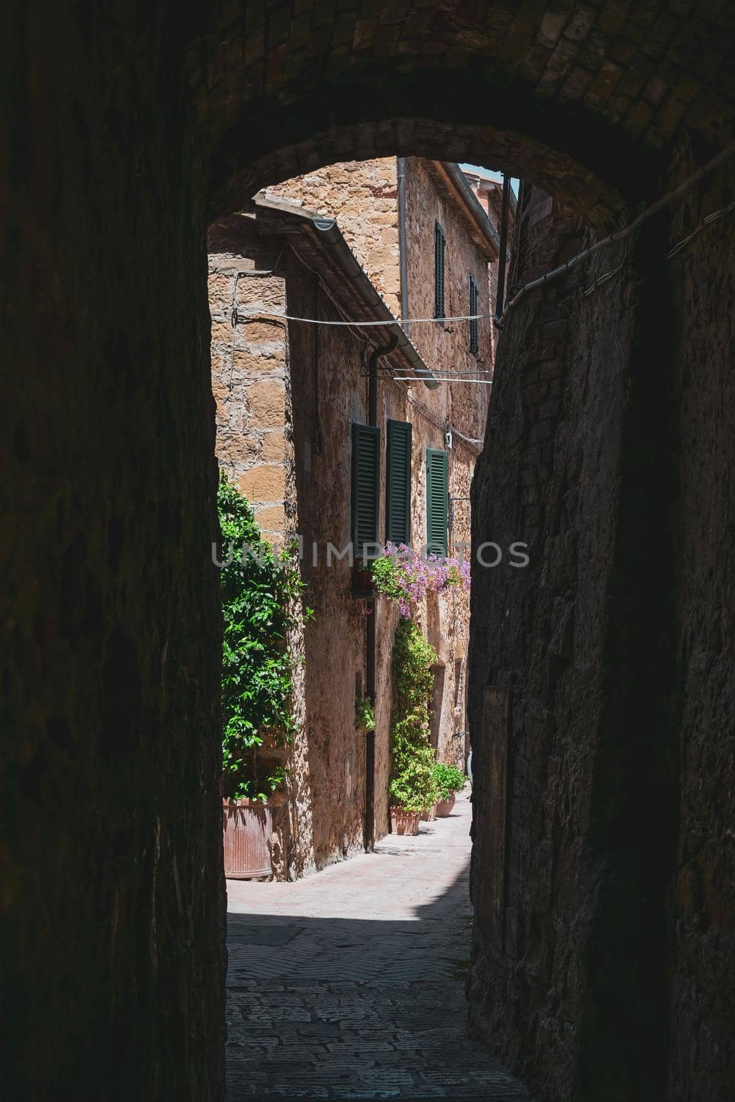 View of the characteristic alleys of the famous town of Pienza, Tuscany, Italy