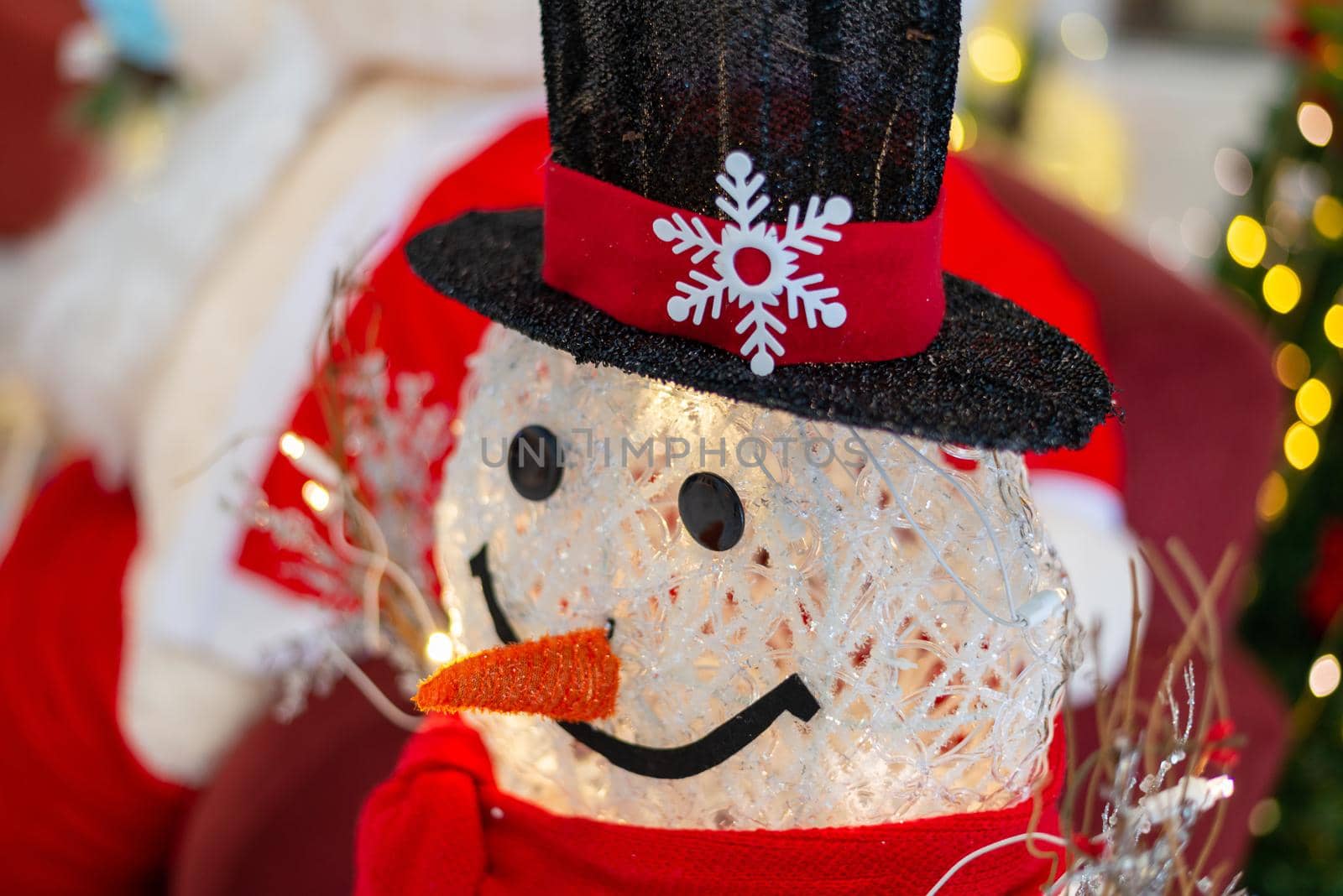 Close up beautiful smile face snowman with LED inside.