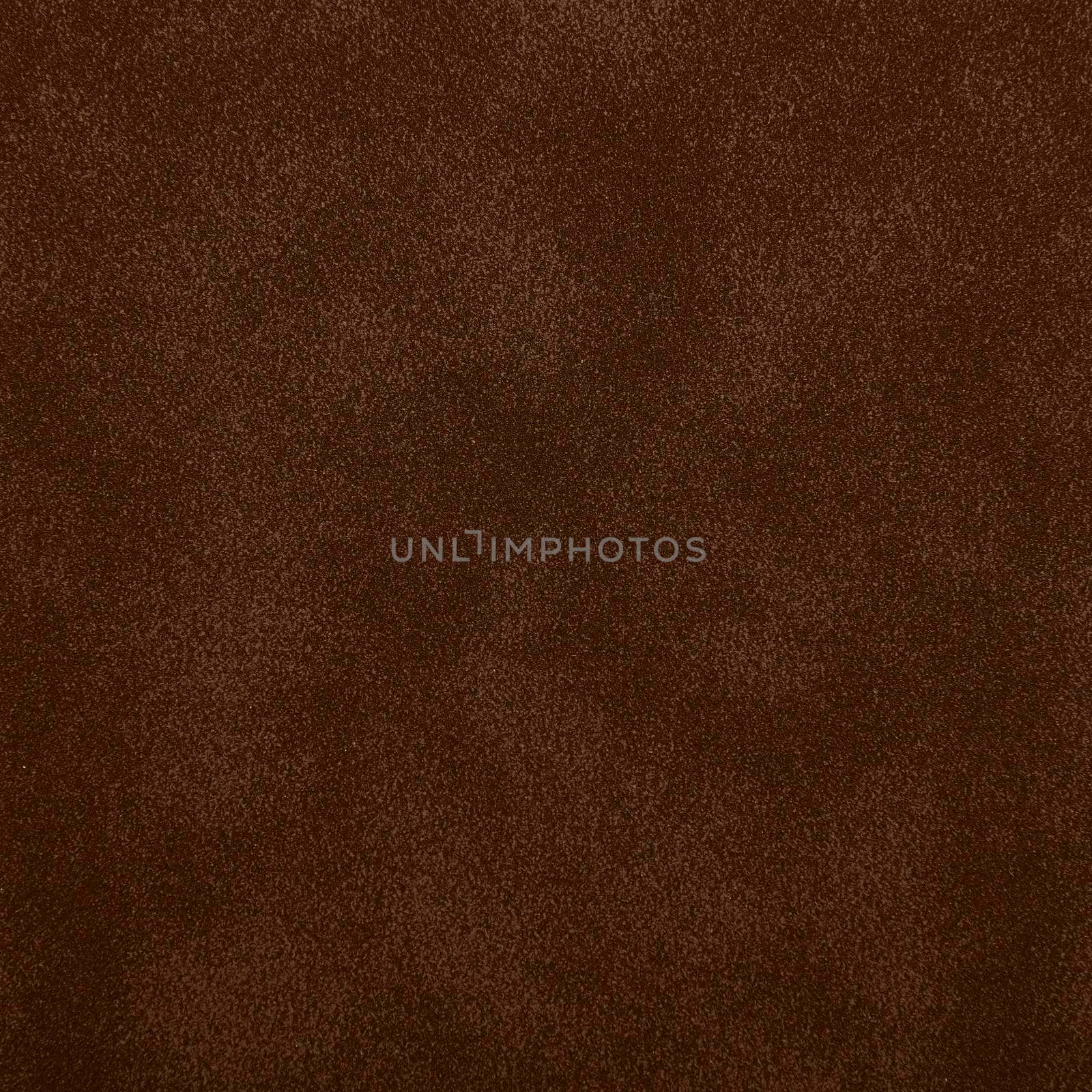 Dark brown abstract uneven grunge background texture of chamois leather grain surface pattern