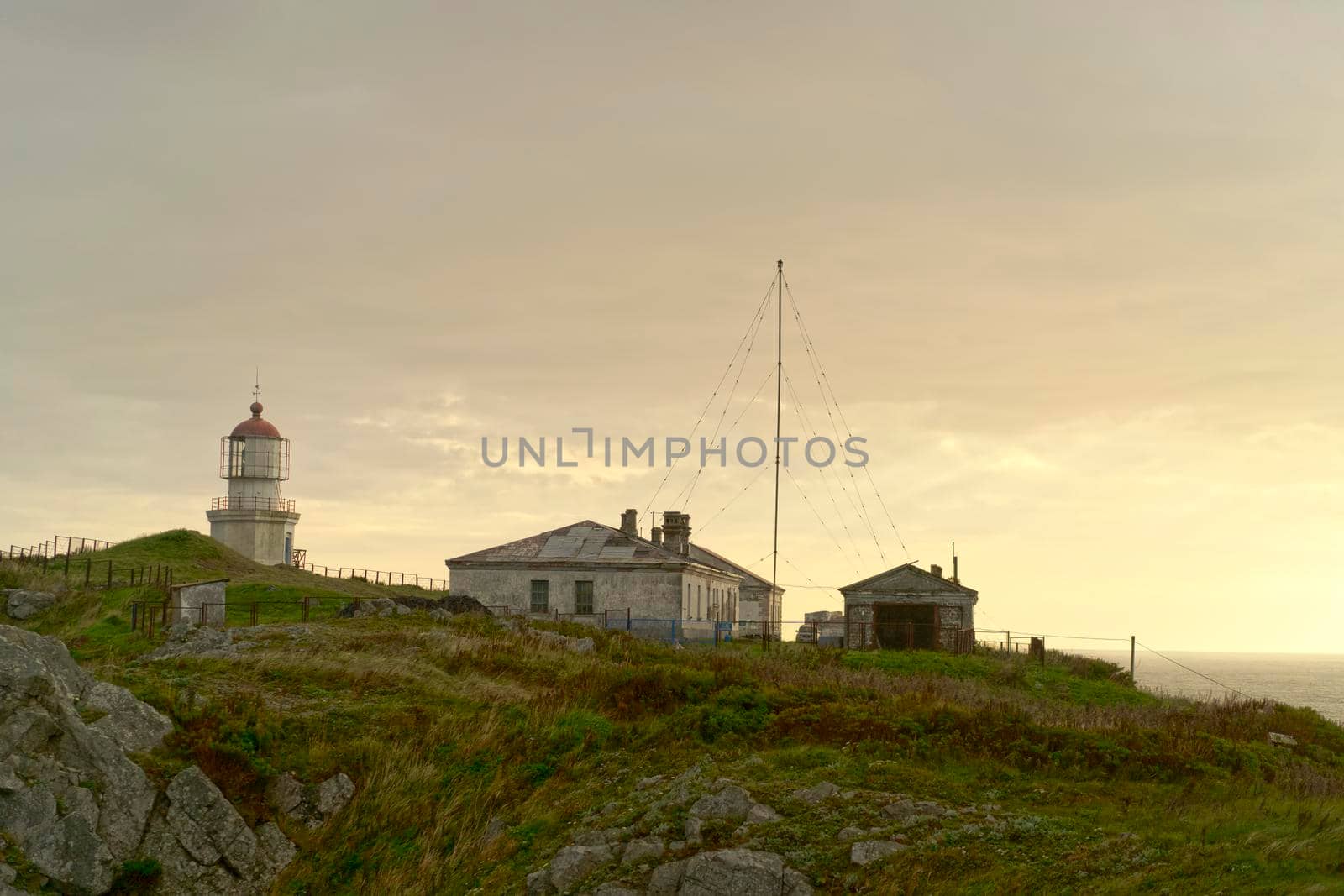 Landscape with a view of the ancient lighthouse. Cape Pospelova, Primorsky Krai