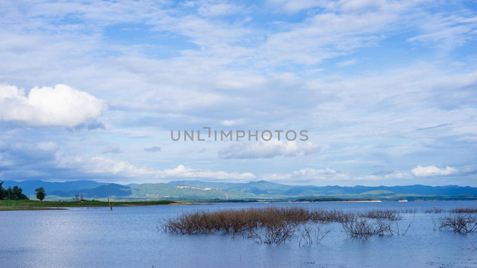 Lake mountains and cloudy sky in Khuean Srinagarindra National Park, Thailand