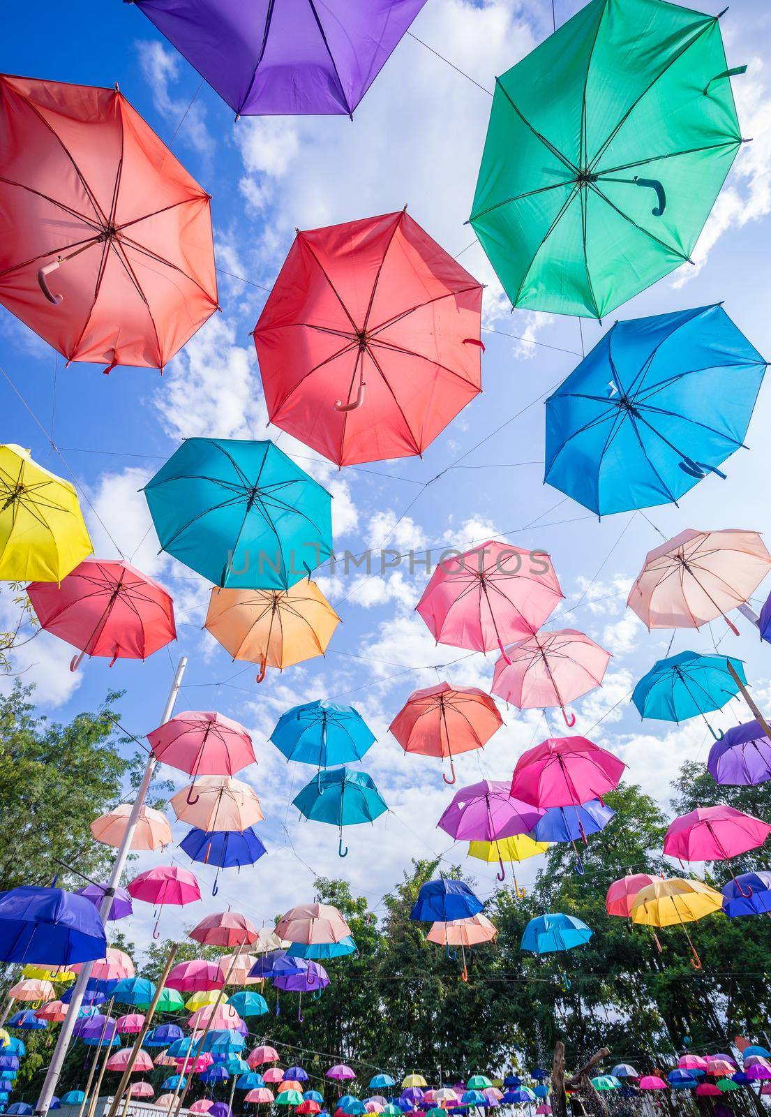 Colorful umbrellas in the sky by domonite