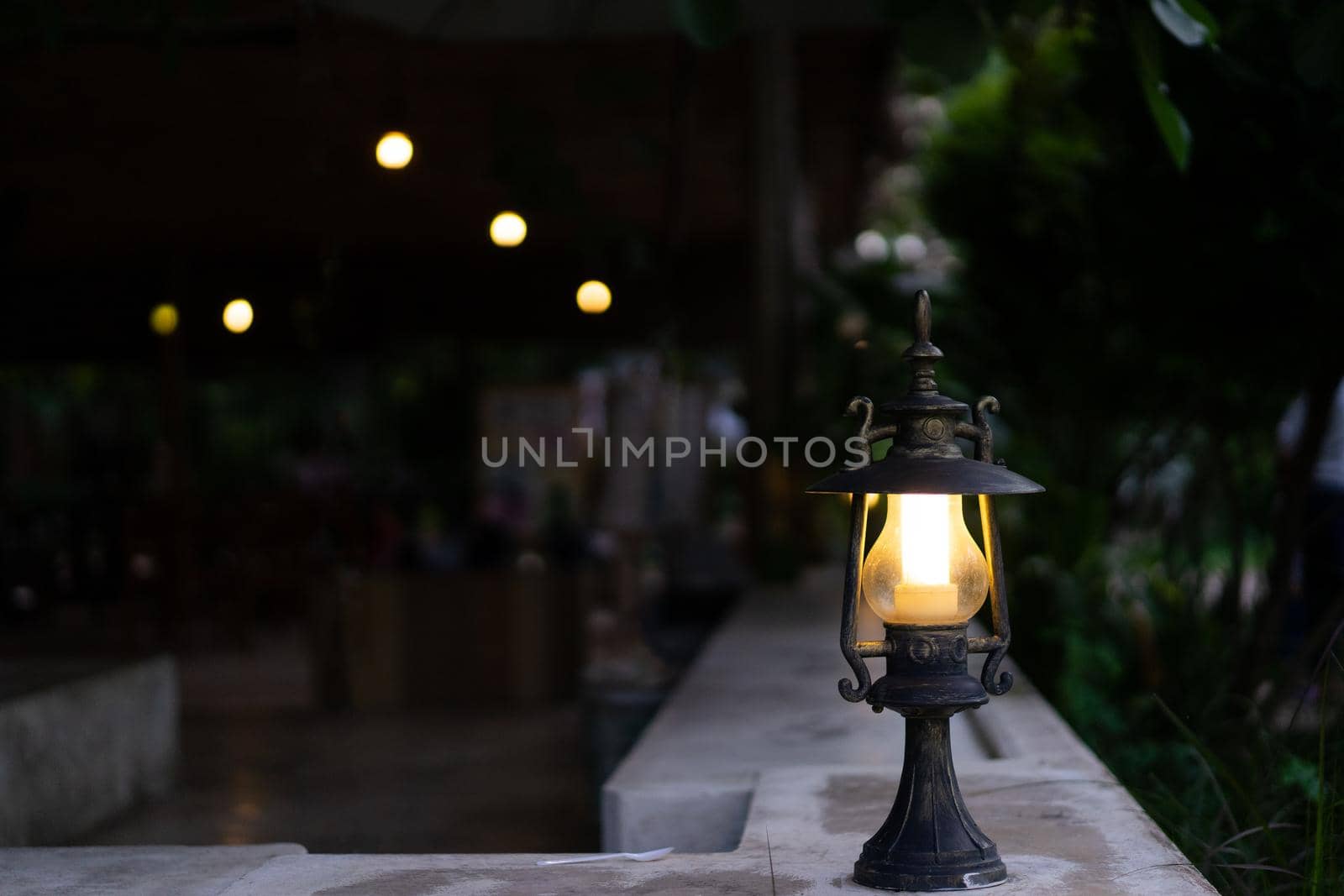 Retro style lantern at the balcony and path