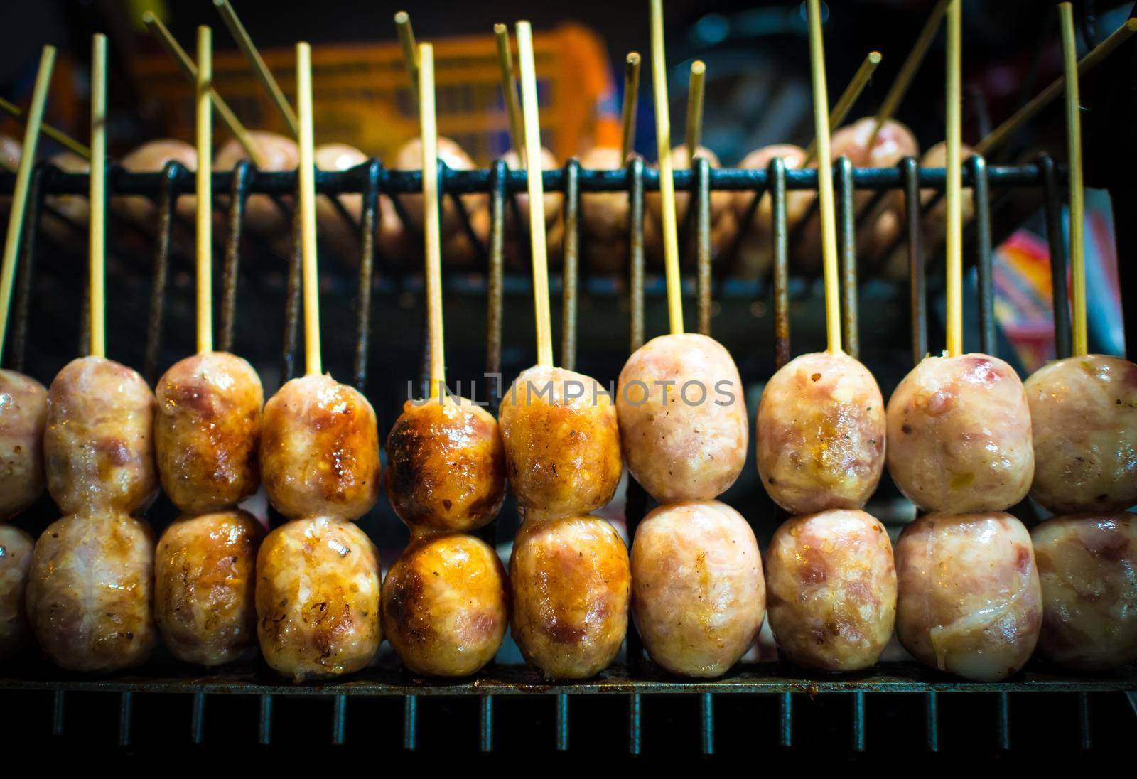 Grilled sausage on the burner