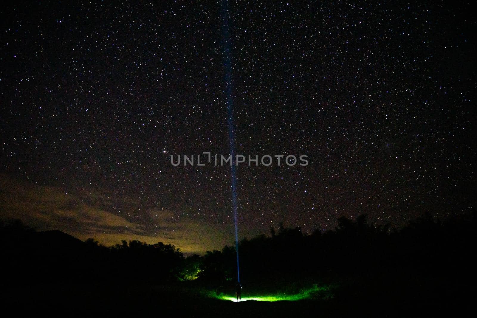 People in dark night with beautiful star at nature park