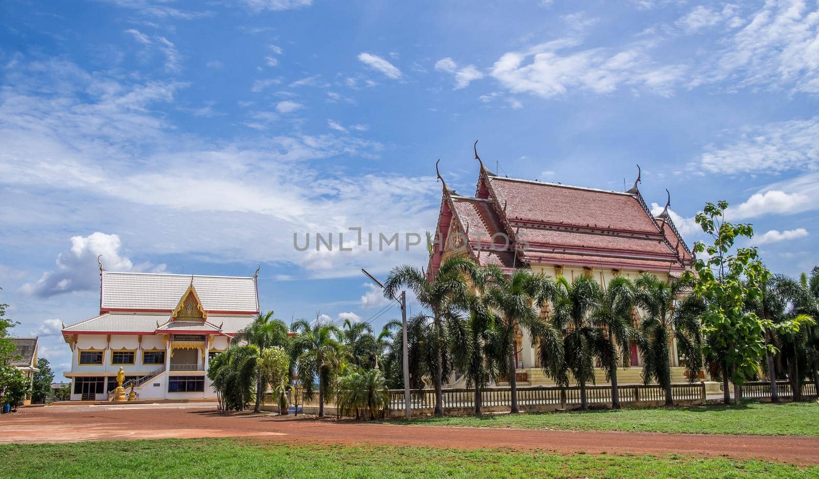 Thai temple named Wat Sramakuea against blue sky in Prachinburi, Thailand