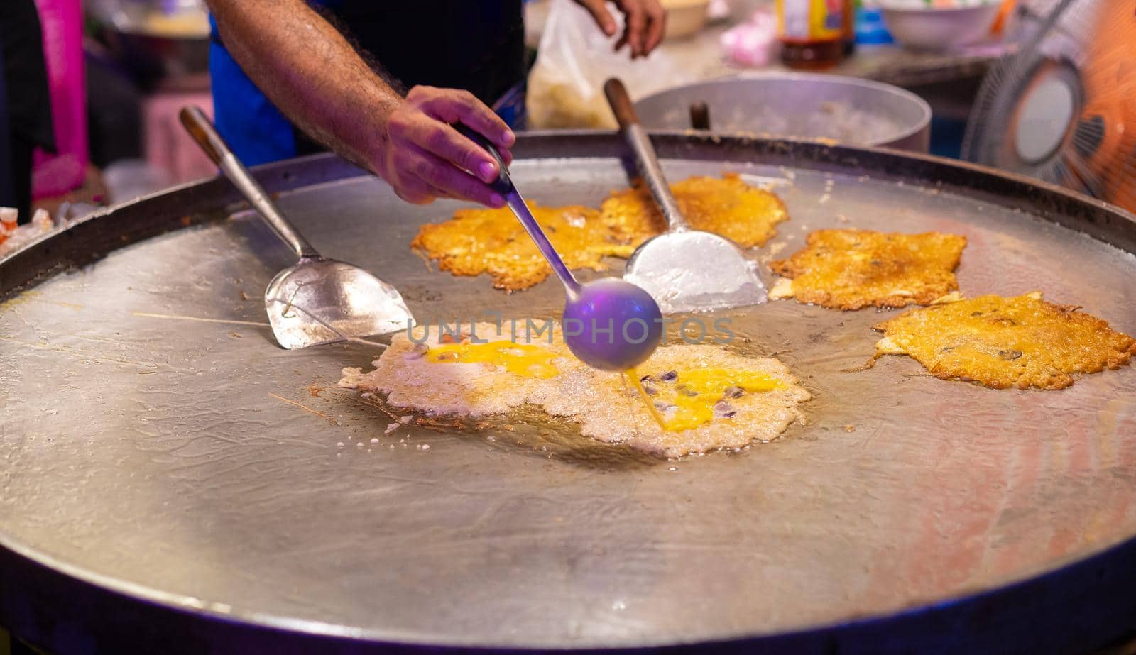 Making Crisp Fried Mussels Pancake on Street food thailand, Fried oyster omelette.