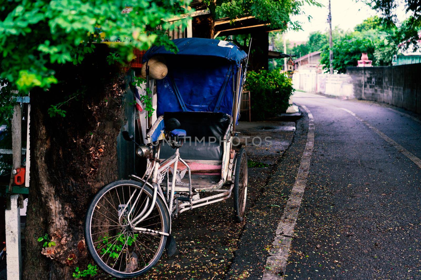 Tricycle on roadside in countryside by domonite