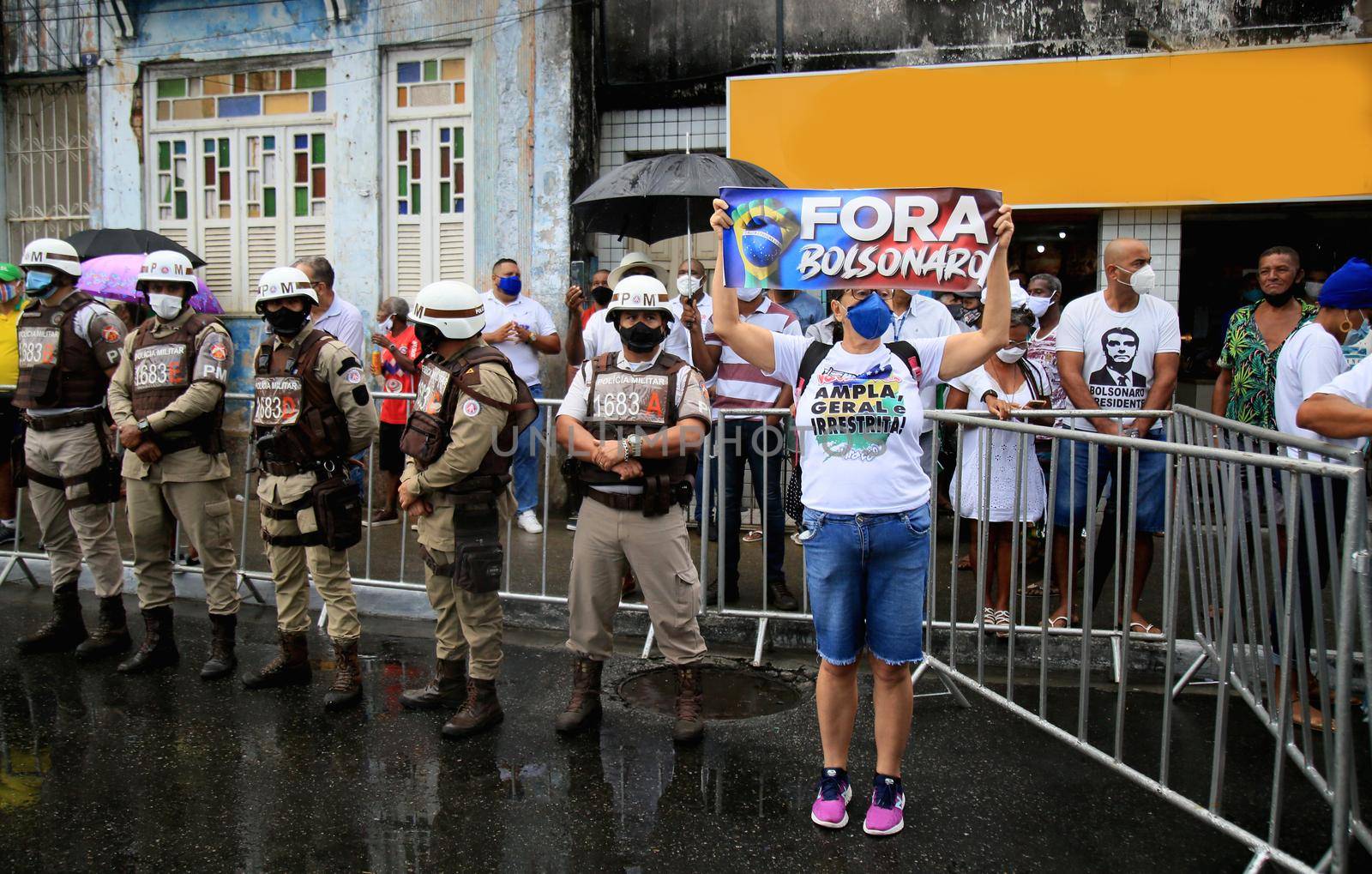 salvador, bahia, brazil - july 2, 2021: Protesters protest against President Jair Bolsonaro's government during Bahia Independence celebrations in the city of Salvador.
