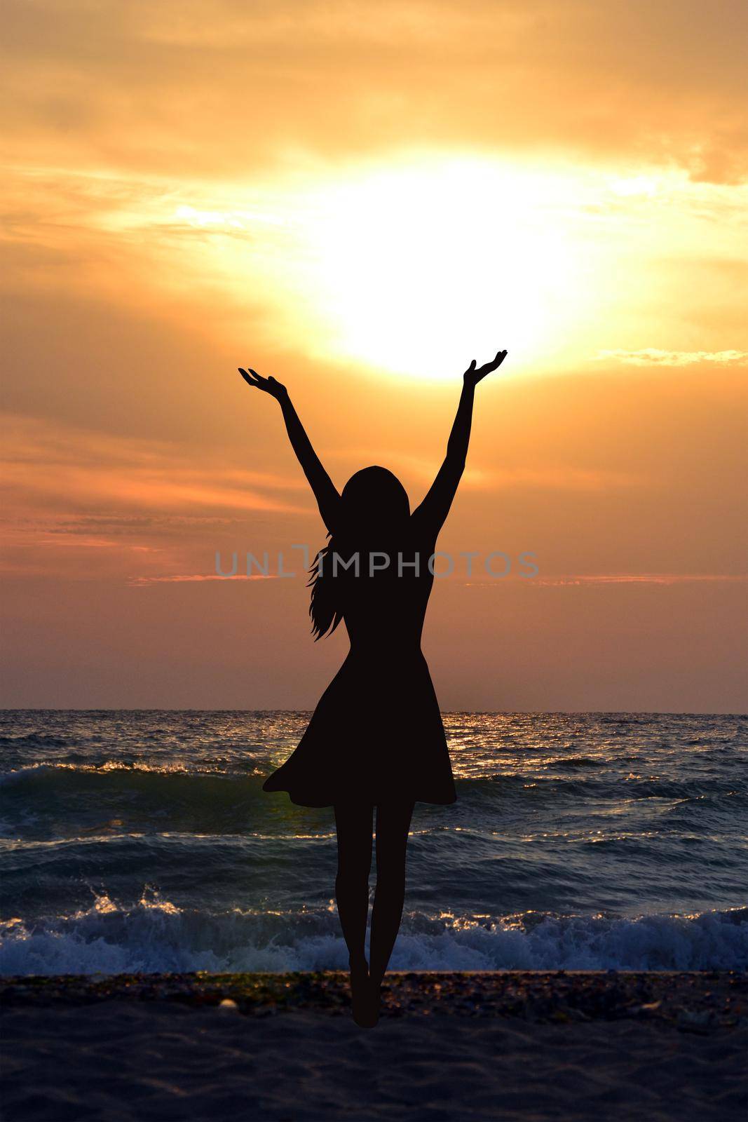 Silhouette of a woman hwo enjoy the sun at sunrise by hibrida13