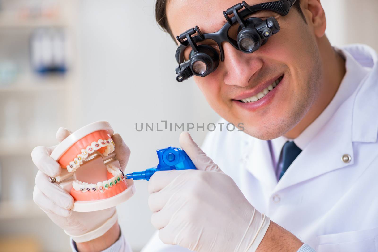 Young dentist working in the dentistry hospital