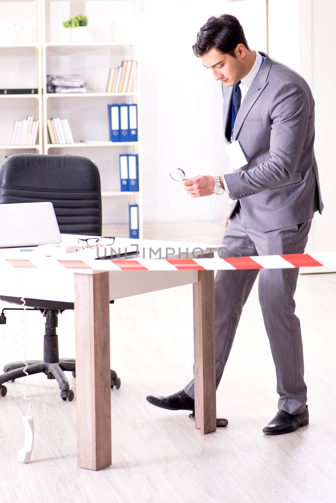 Forensics investigator at the scene of office crime