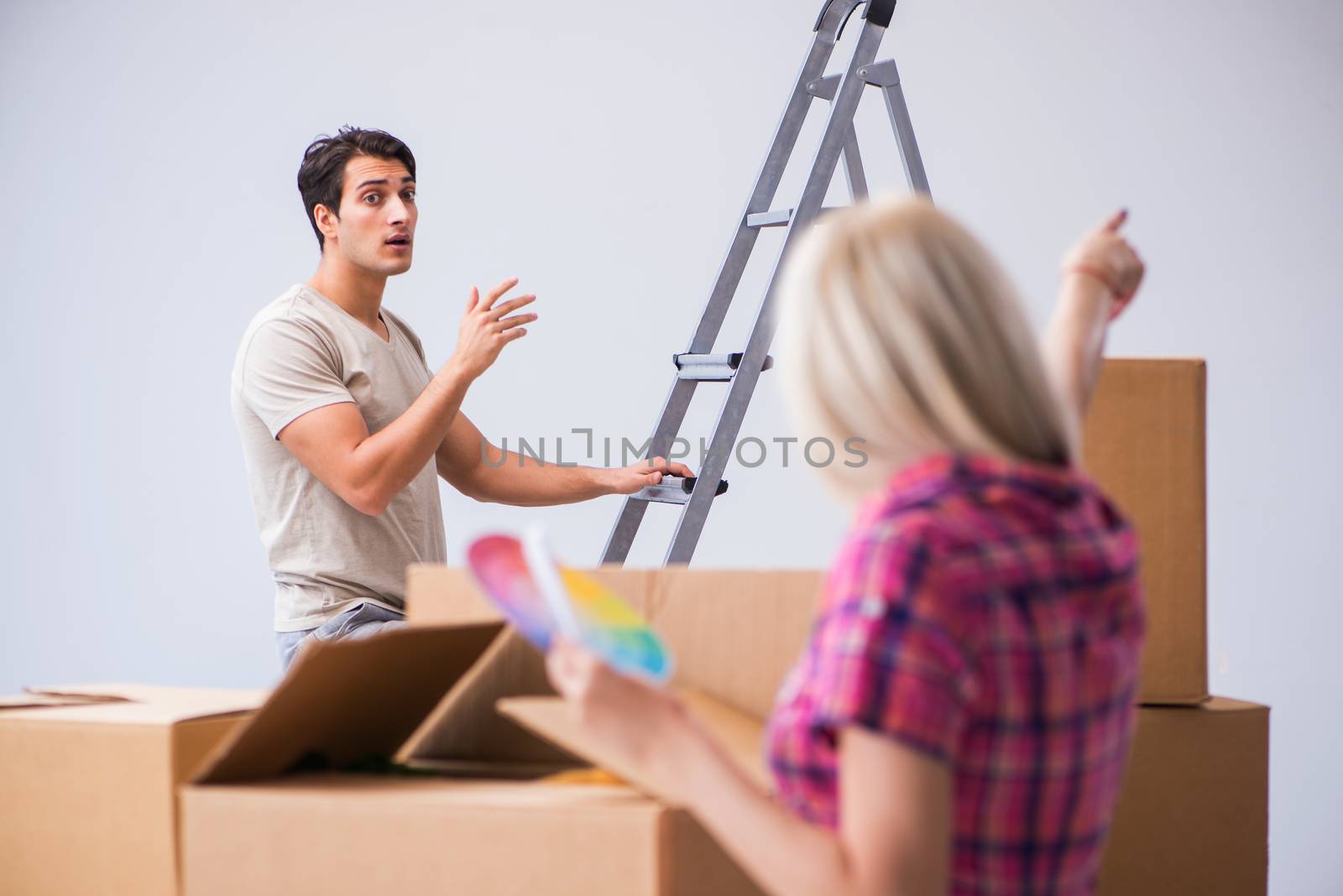 Young family preparing for home renovation by Elnur