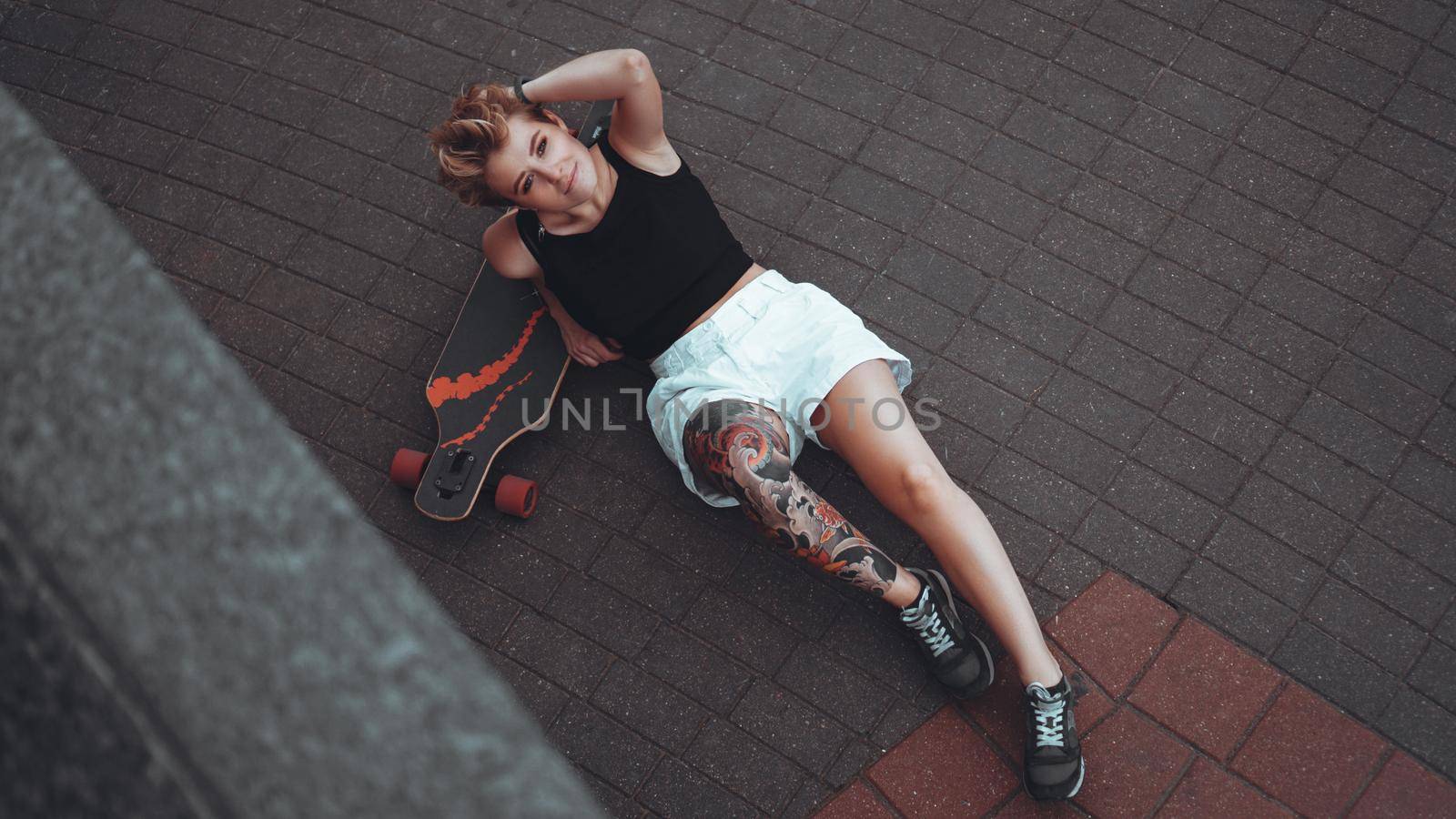 Beautiful girl with tattooed body and short hair by natali_brill