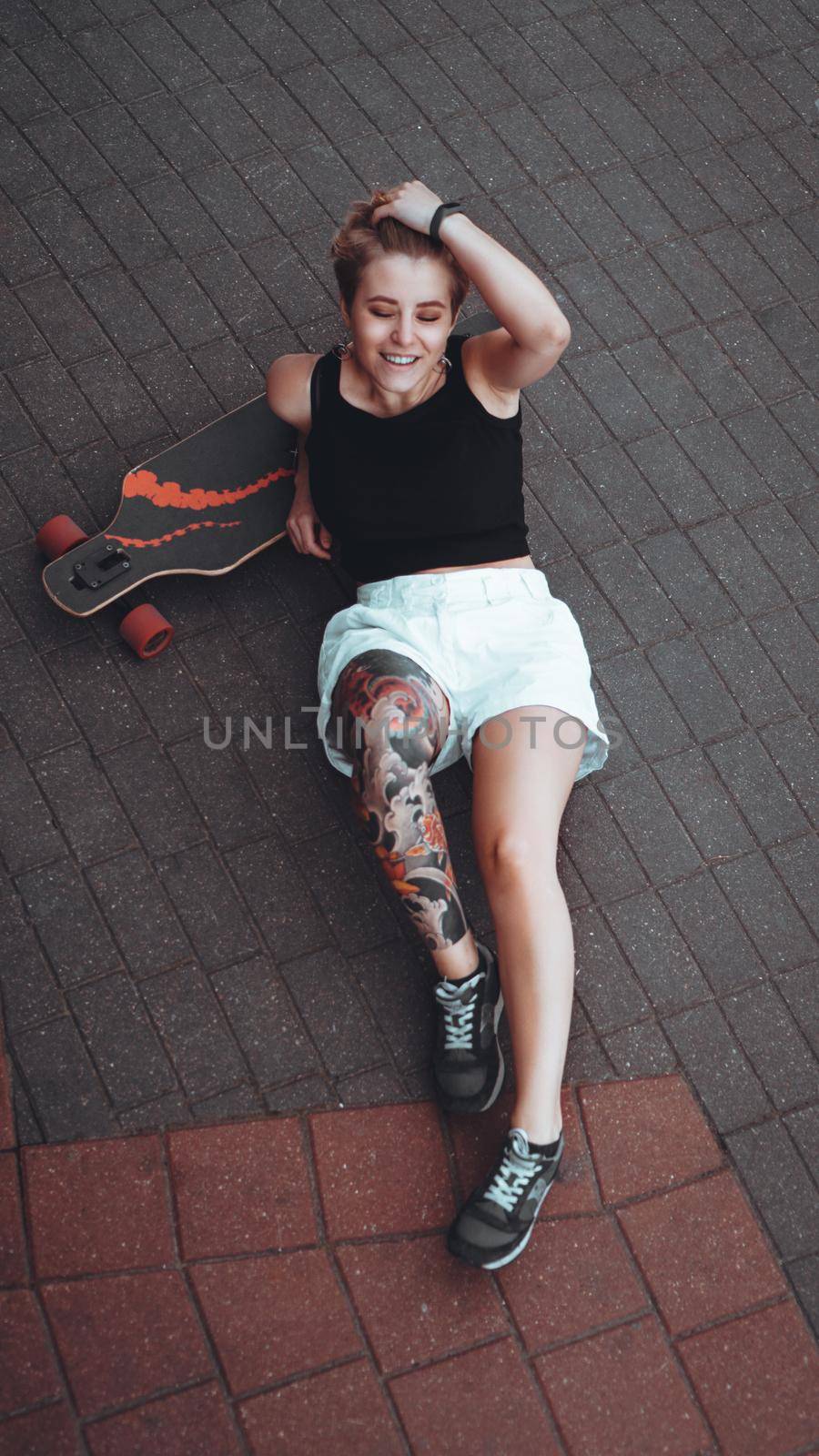 Beautiful girl with tattooed body and short hair by natali_brill