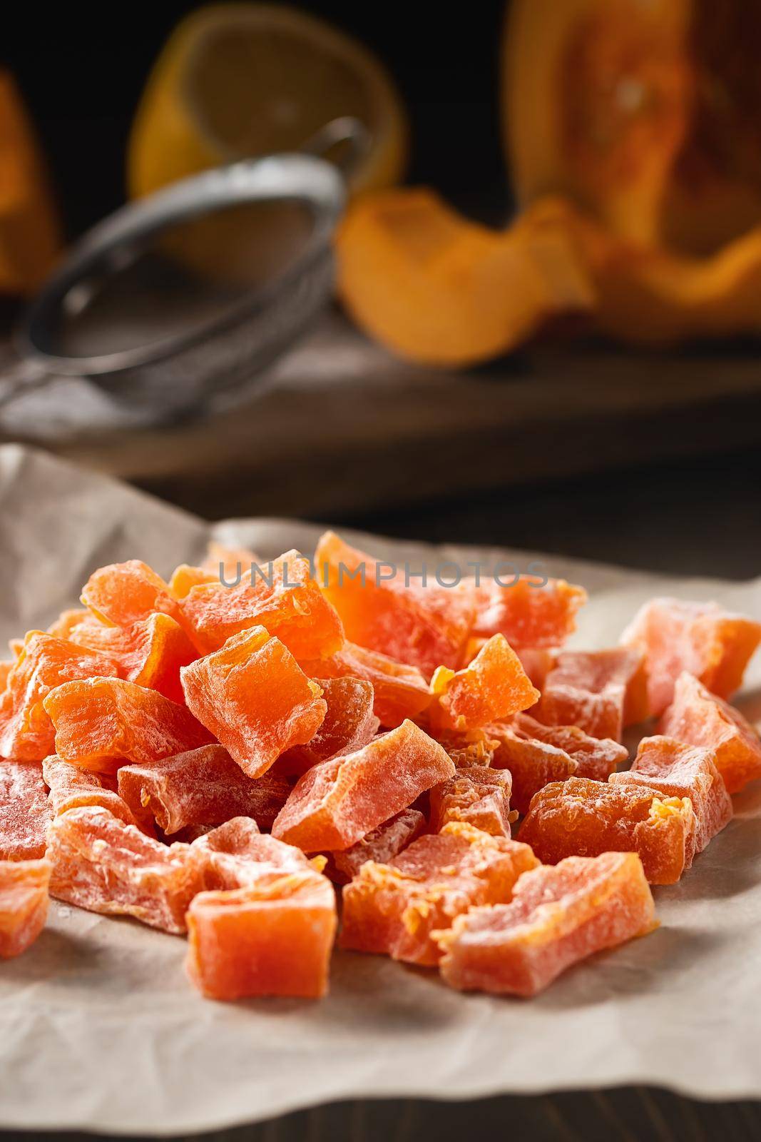 Cooking Natural farm homemade candied pumpkin fruits sprinkled with powdered sugar by galsand