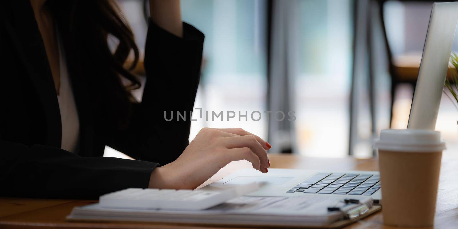 A woman studying webinar by laptop computer. by itchaznong