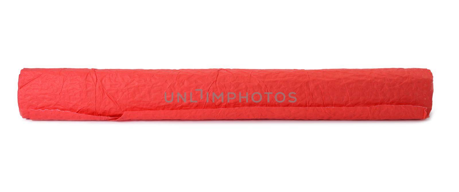 roll of red crumpled paper for gift wrapping isolated on white background by ndanko