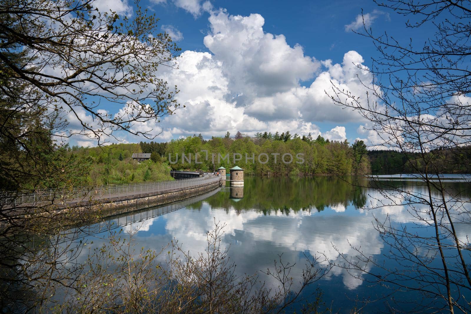 Panoramic image of Neye reservoir with clouds at springtime, Wipperfurth, Bergisches Land, Germany
