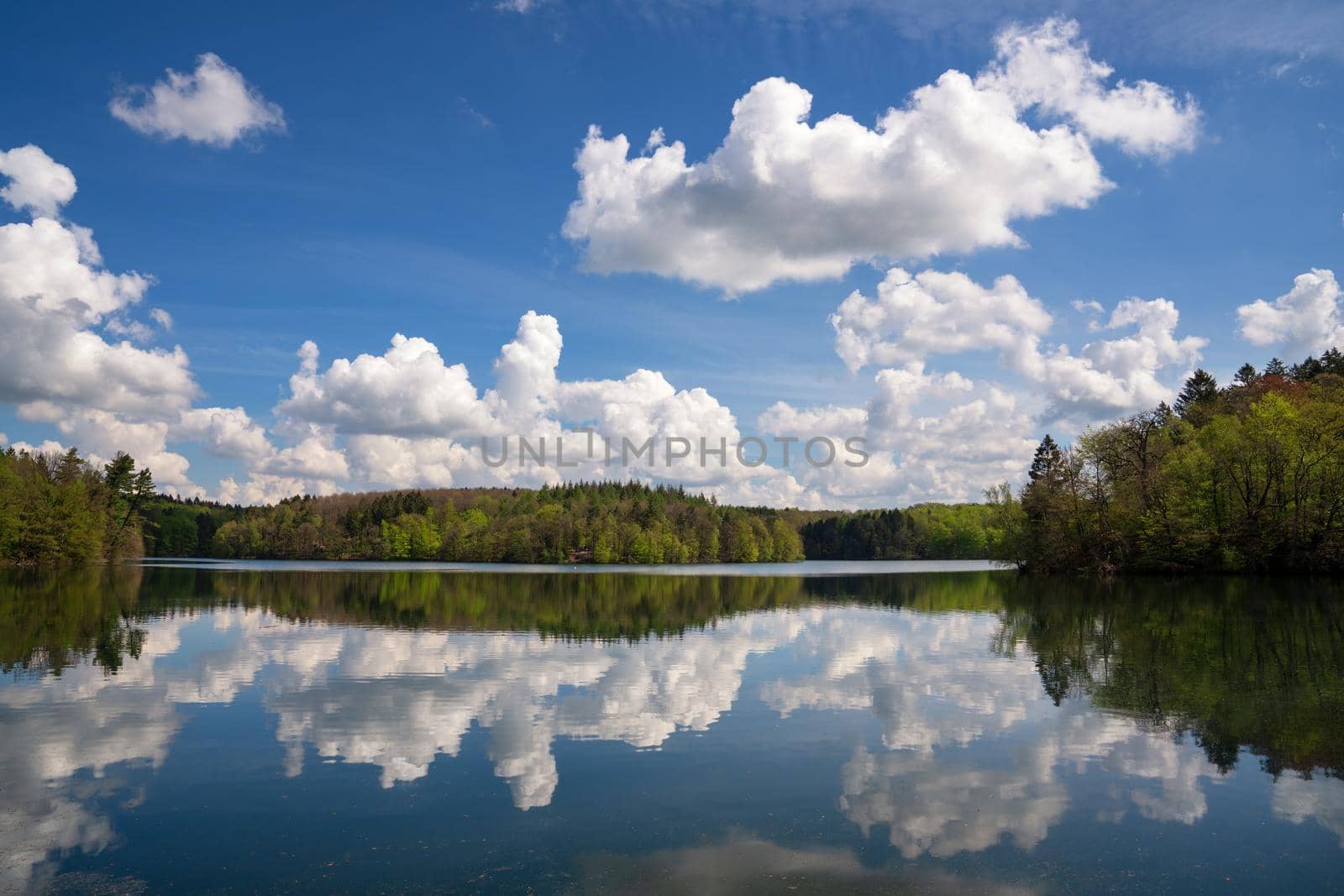 Panoramic image of Neye reservoir with clouds at springtime, Wipperfurth, Bergisches Land, Germany