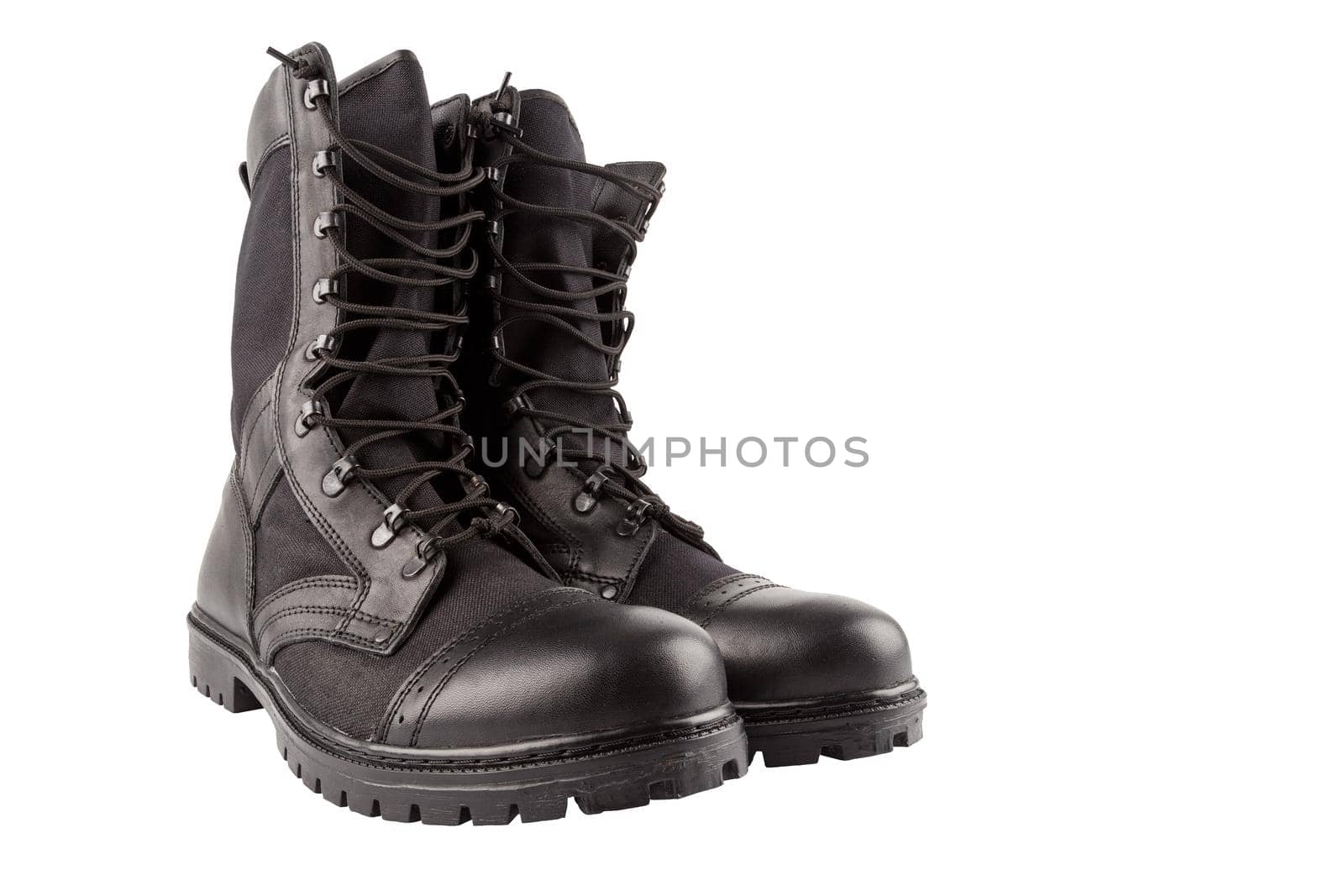 pair of new black summertime lightweight military boots with nylon parts isolated on white background