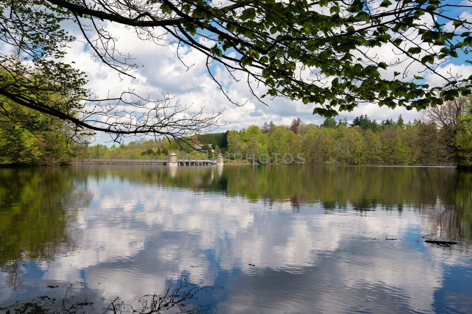 Panoramic image of Neye reservoir with clouds at springtime, Wipperfurth, Bergisches Land, Germany