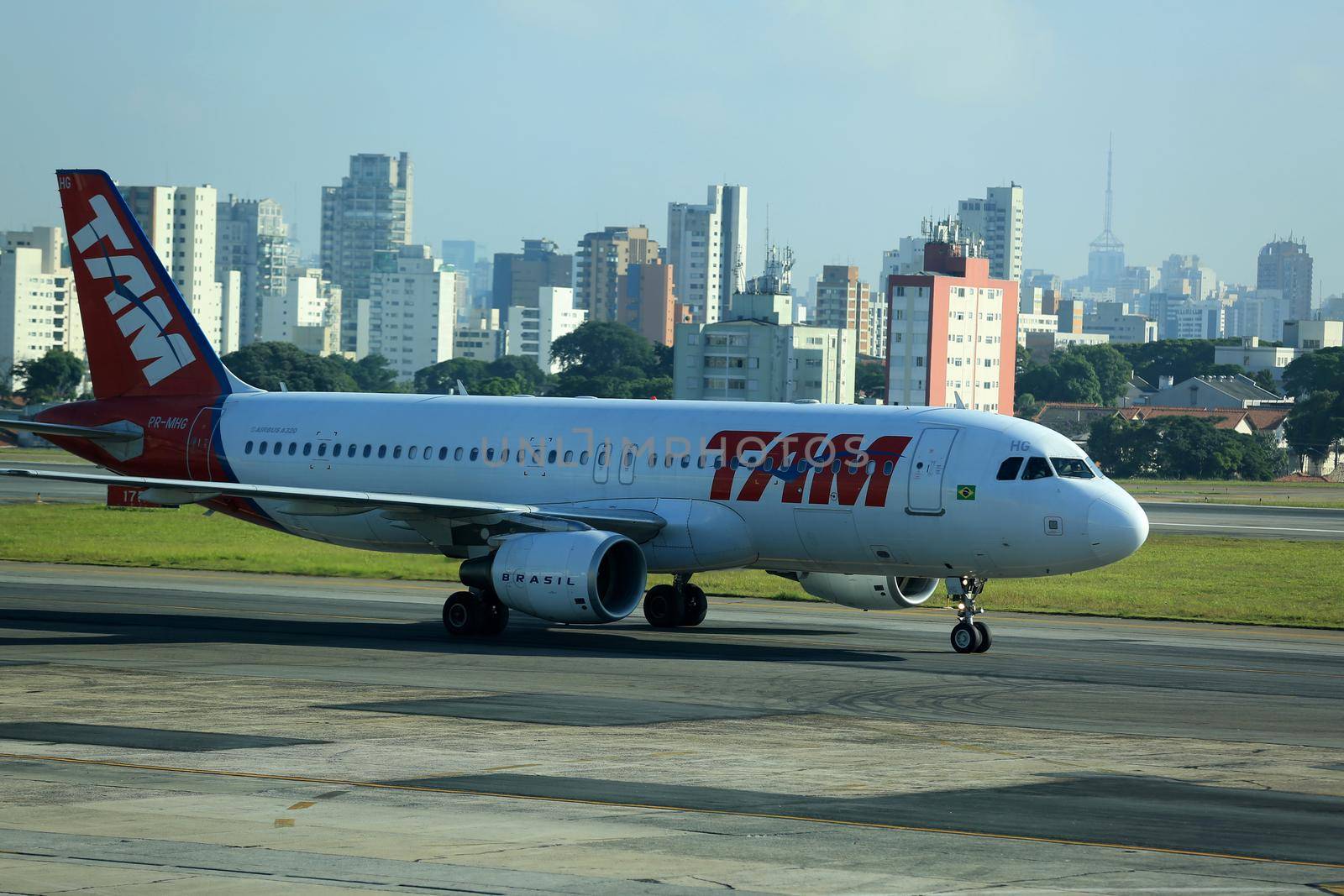 sao paulo, sao paulo, brazil - february 11, 2017: Airbus aircraft of Tam Linhas Aareas is seen in the apron of Congonhas Airport in the city of Sao Paulo.
