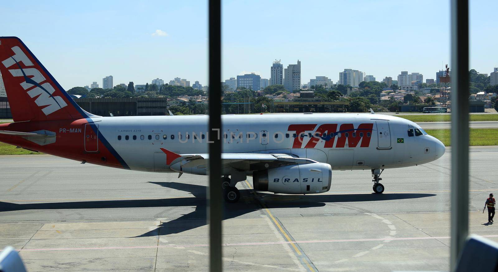 sao paulo, sao paulo, brazil - february 11, 2017: Airbus aircraft of Tam Linhas Aareas is seen in the apron of Congonhas Airport in the city of Sao Paulo.