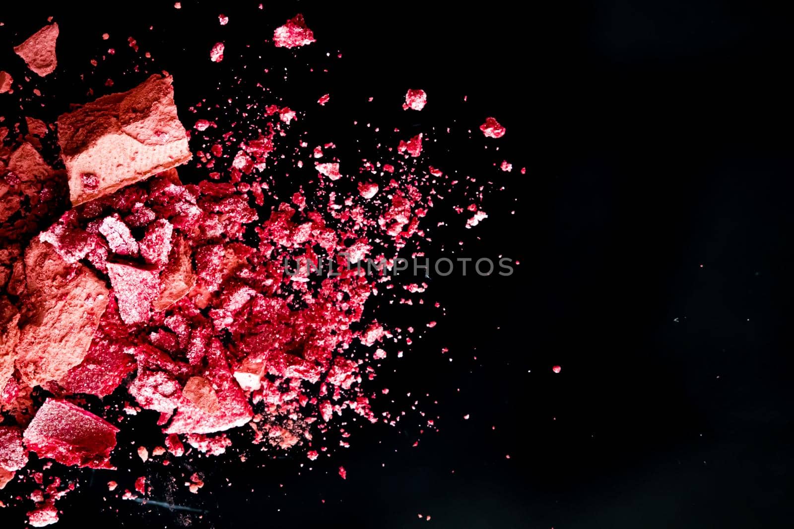 Crushed cosmetics, mineral organic eyeshadow, blush and cosmetic powder isolated on black background, makeup and beauty banner, flatlay design by Anneleven