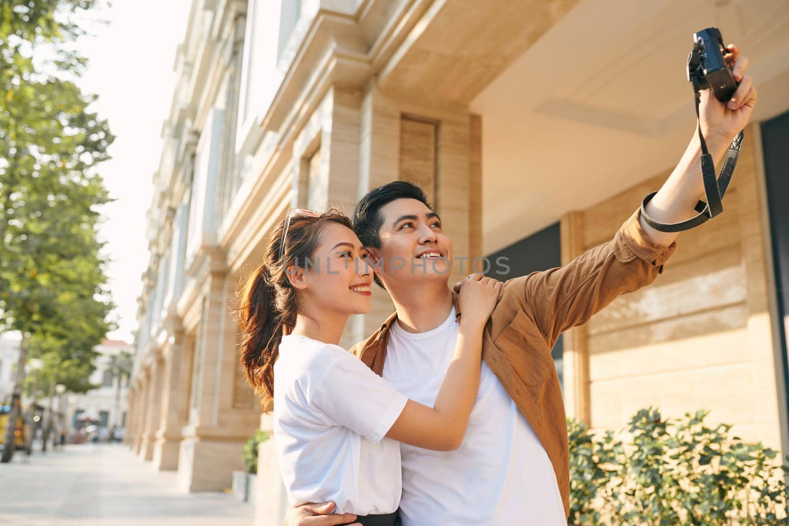 Happy tourists taking photo of themselves 