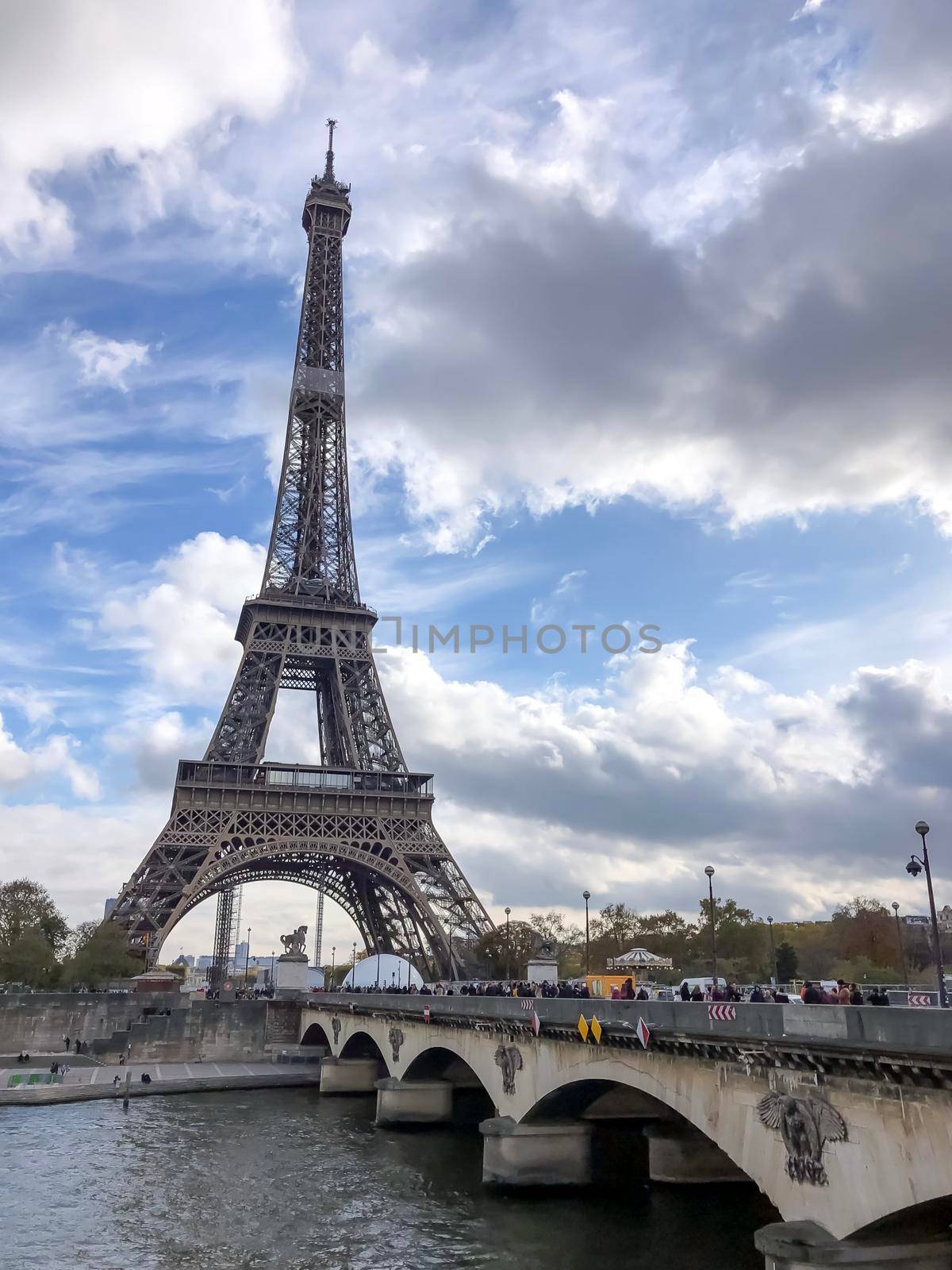 Eiffel Tower at blue cloudy sky, Paris, France. High quality photo