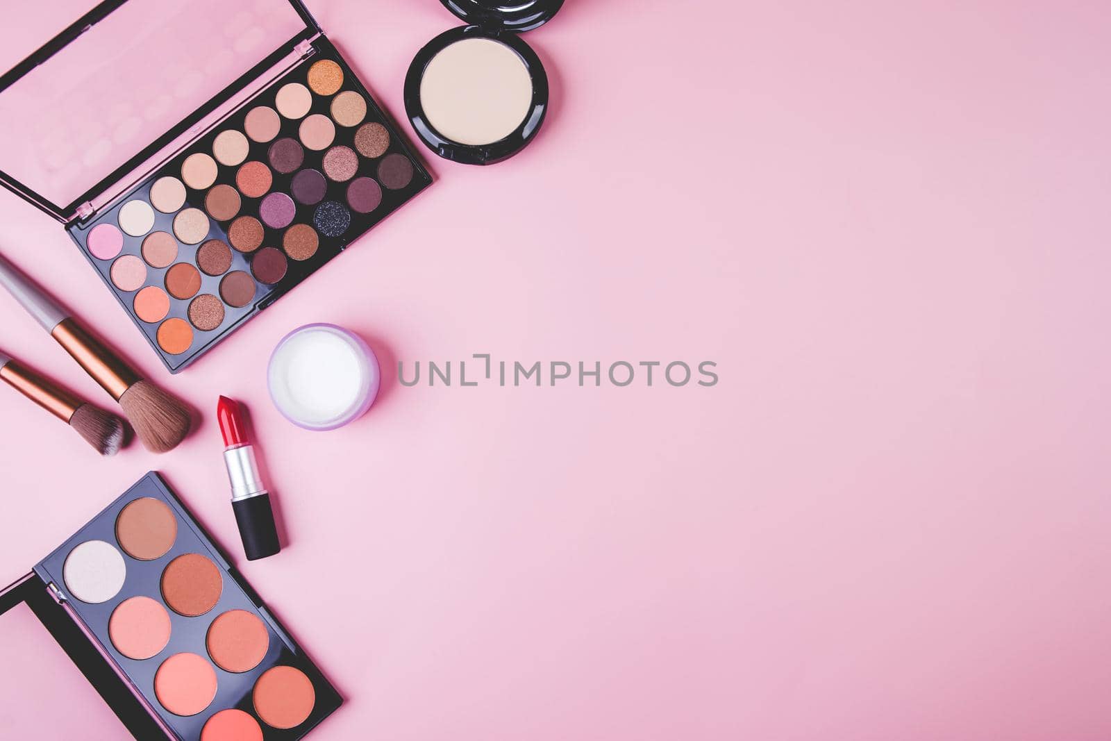 Set of cosmetic makeup tool isolated on pink background, top view, flat lay, brush and lipstick and makeup palette kit, no people, nobody, copy space, group object about beauty, collection make-up.