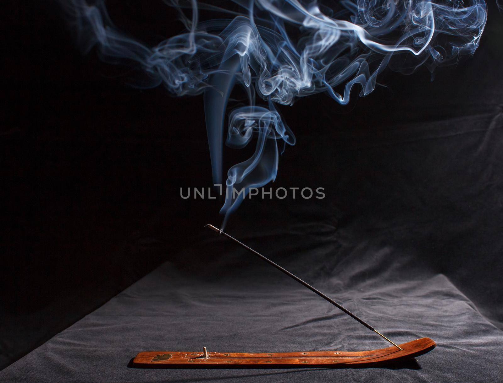 indian incense stick with smoke by raddnatt