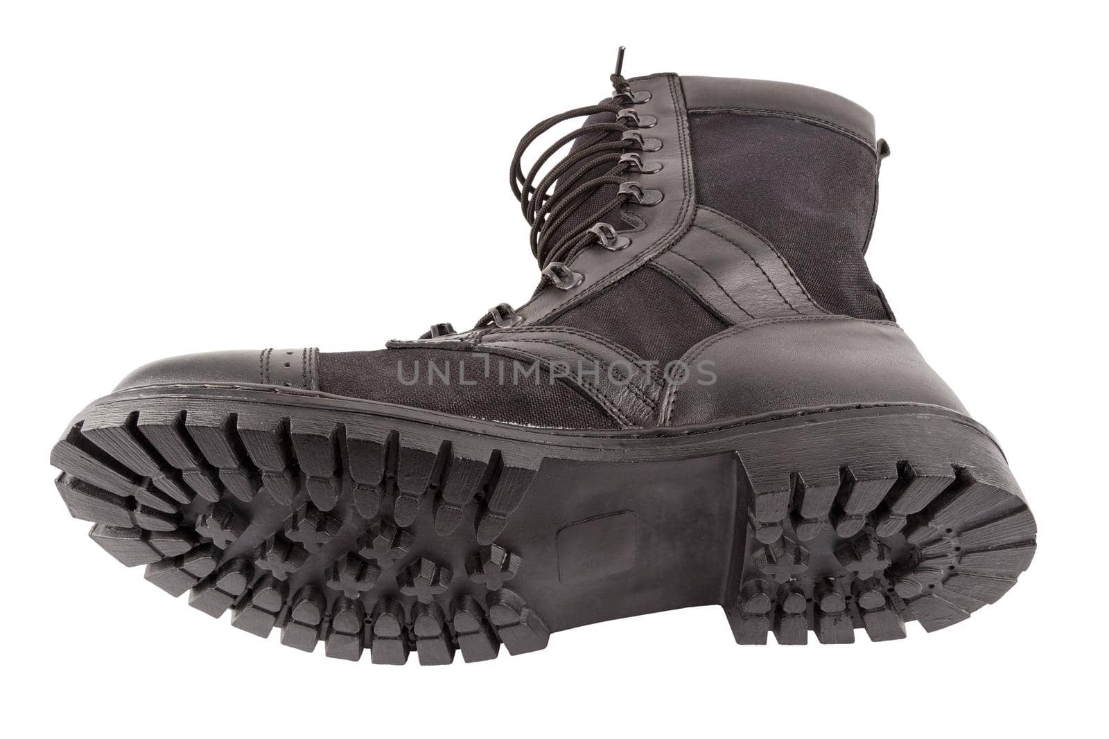 new black summertime lightweight military boot with nylon parts isolated on white background.
