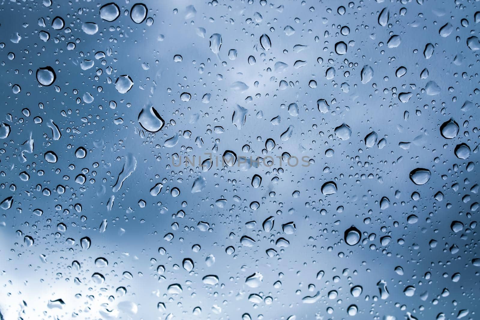 Wet glass background. Water drops.