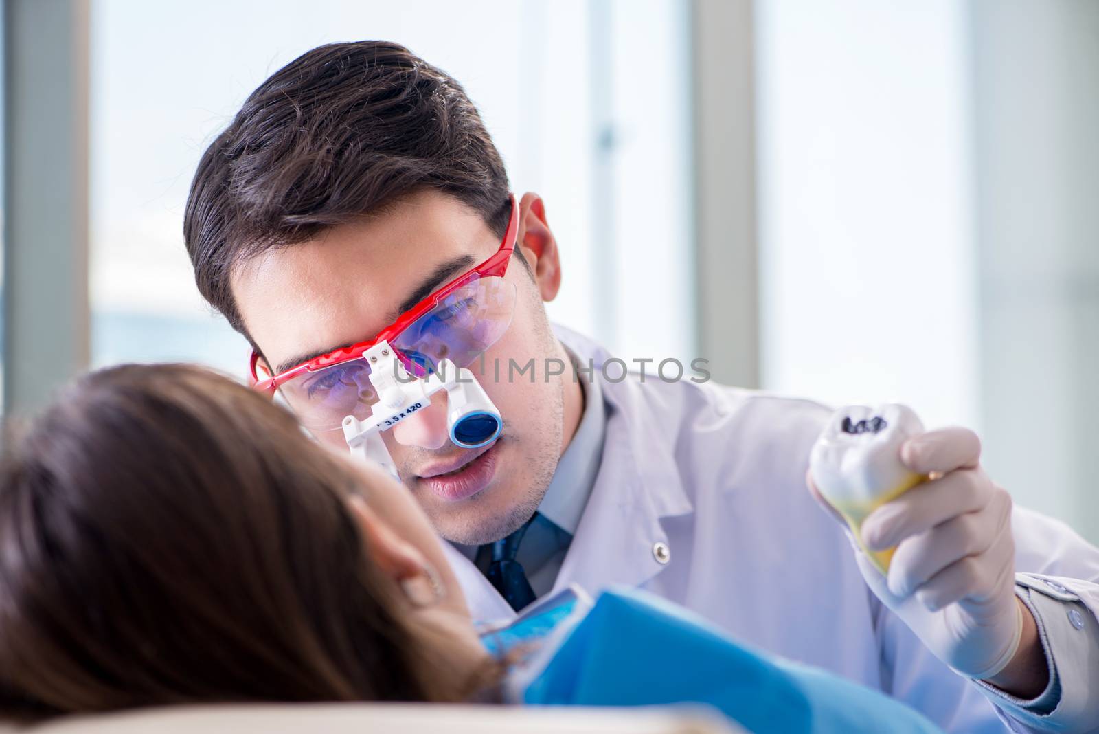 Patient visiting dentist for regular check-up and filling