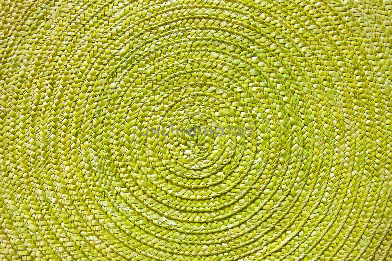 Green place mat wicker texture background. by nightlyviolet