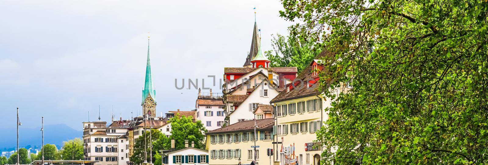 Zurich, Switzerland circa June 2021: Streets and historic Old Town buildings near main railway train station Zurich HB, Hauptbahnhof, Swiss architecture and travel destination