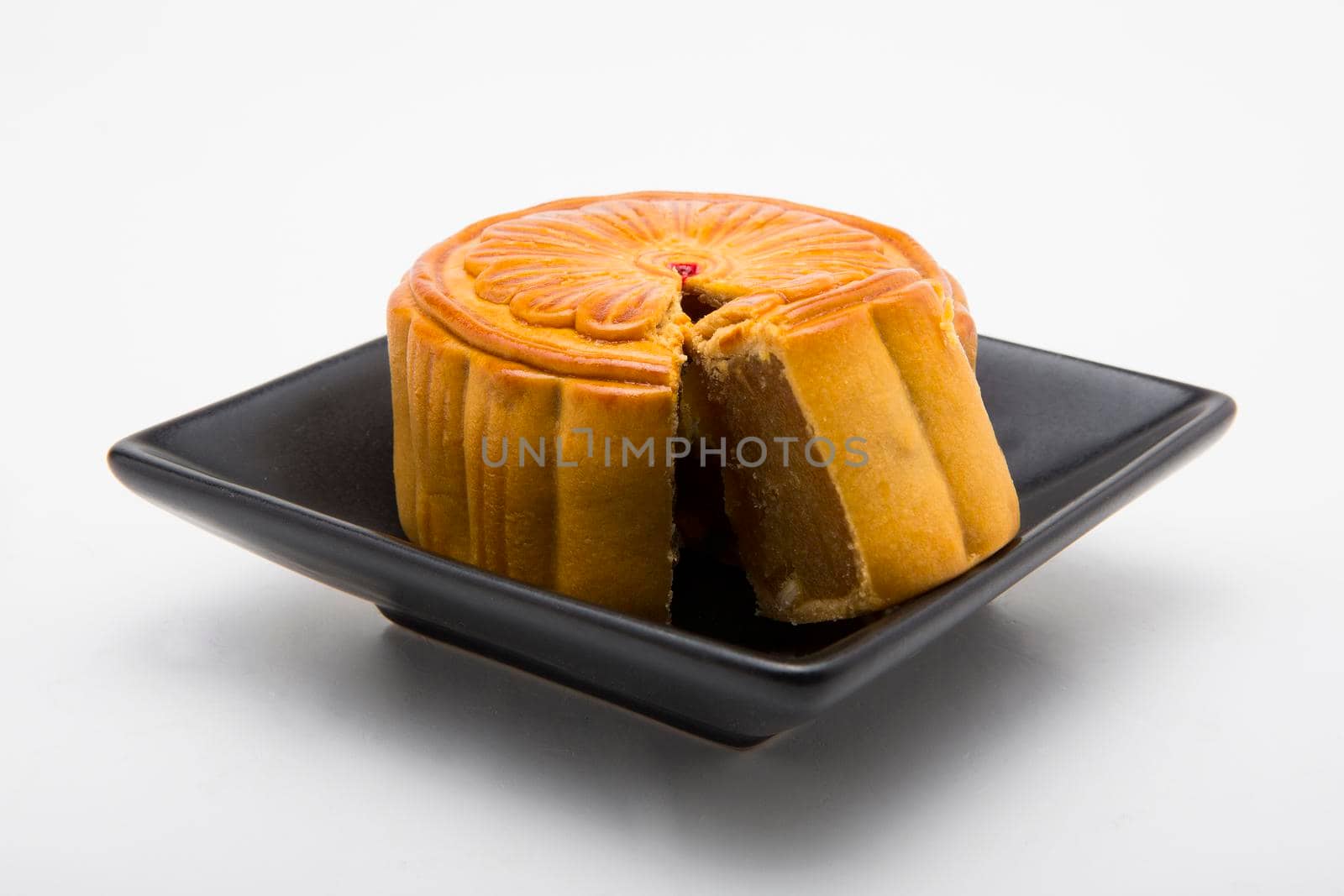 Mooncake and tea,Chinese mid autumn festival food. by titipong