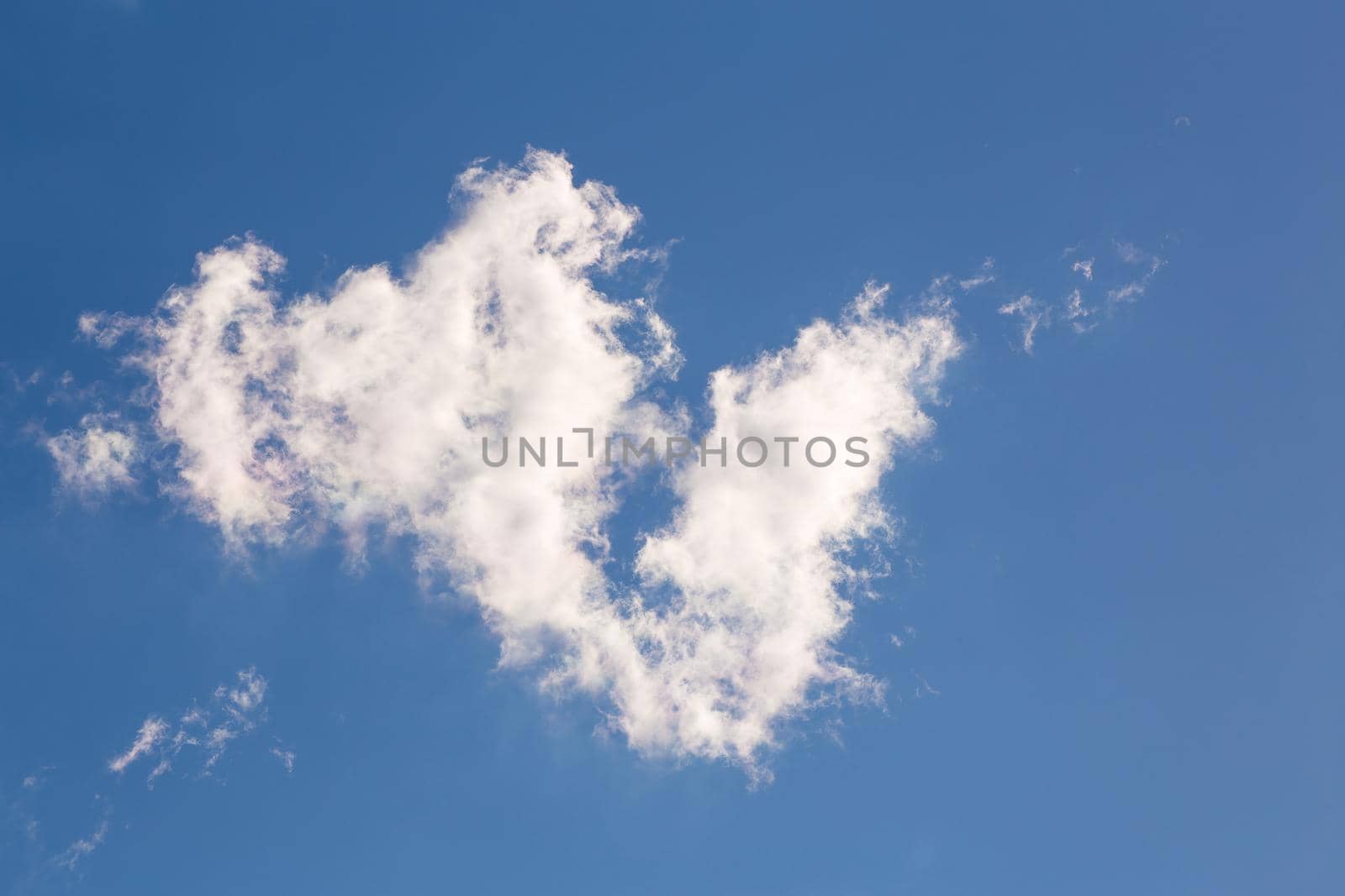Beautiful blue sky with white cloud. Sky panorama for screensavers, postcards, calendar, presentations. Warm summer day.