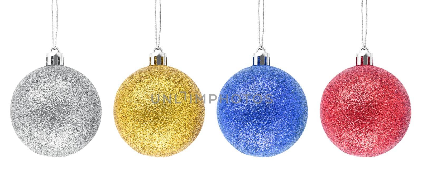 Hanging silver, golden, blue, red glitter Christmas baubles isolated on white background.