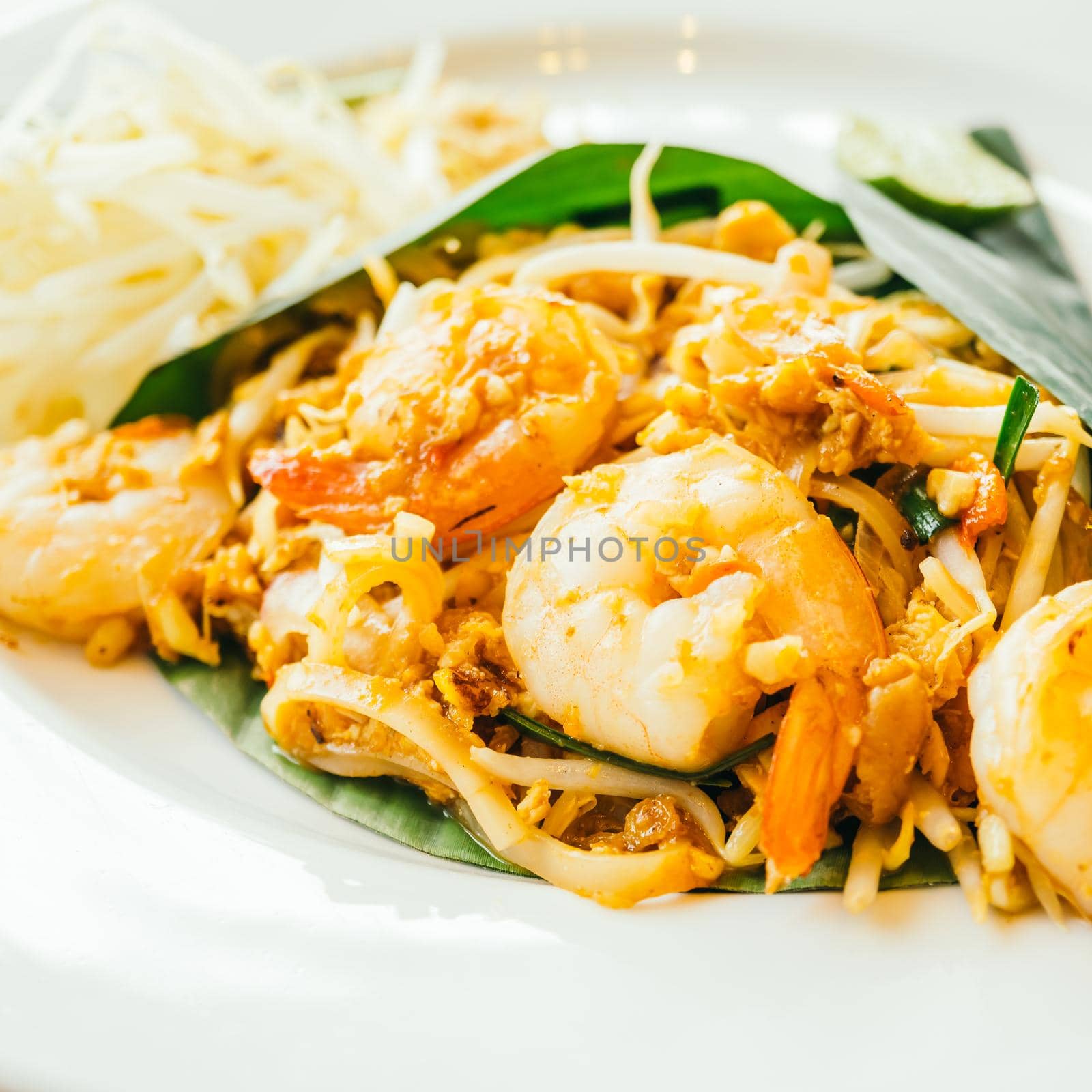 Pad thai noodles with prawn in white plate - Color Filter Processing