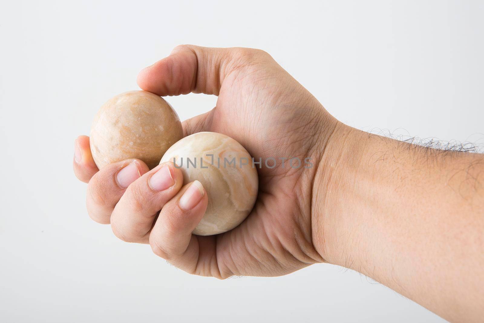 Massage stones on the palm