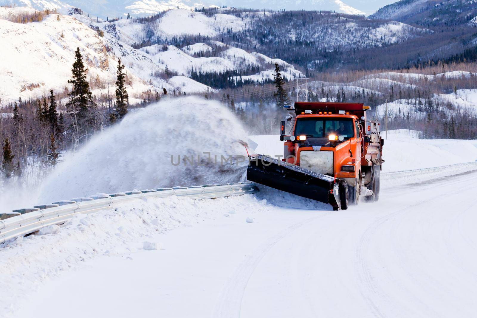 Snow plough clearing road in winter storm blizzard by PiLens