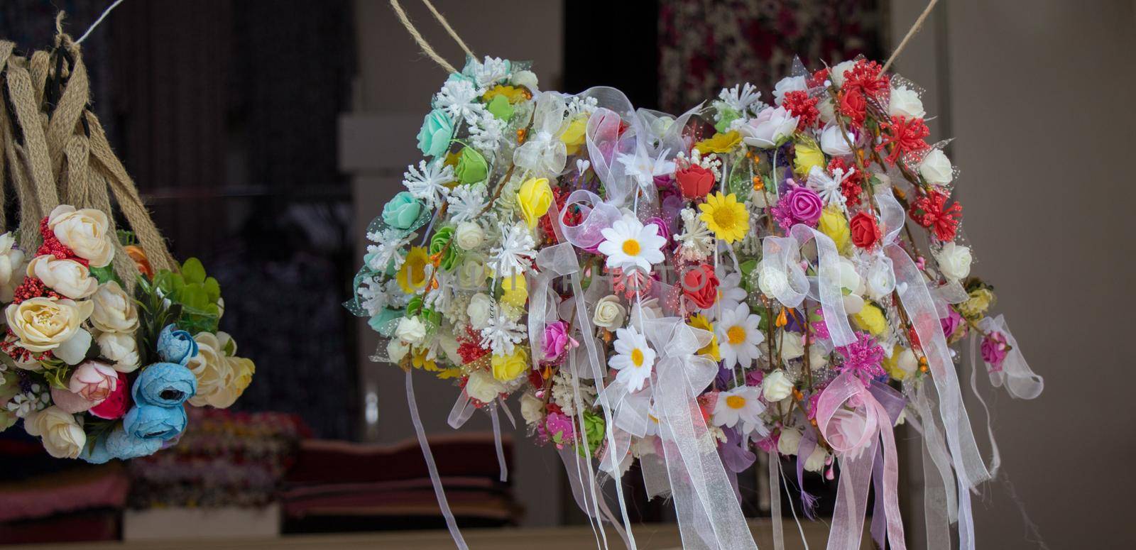 colorful crowns made of fake flowers by berkay