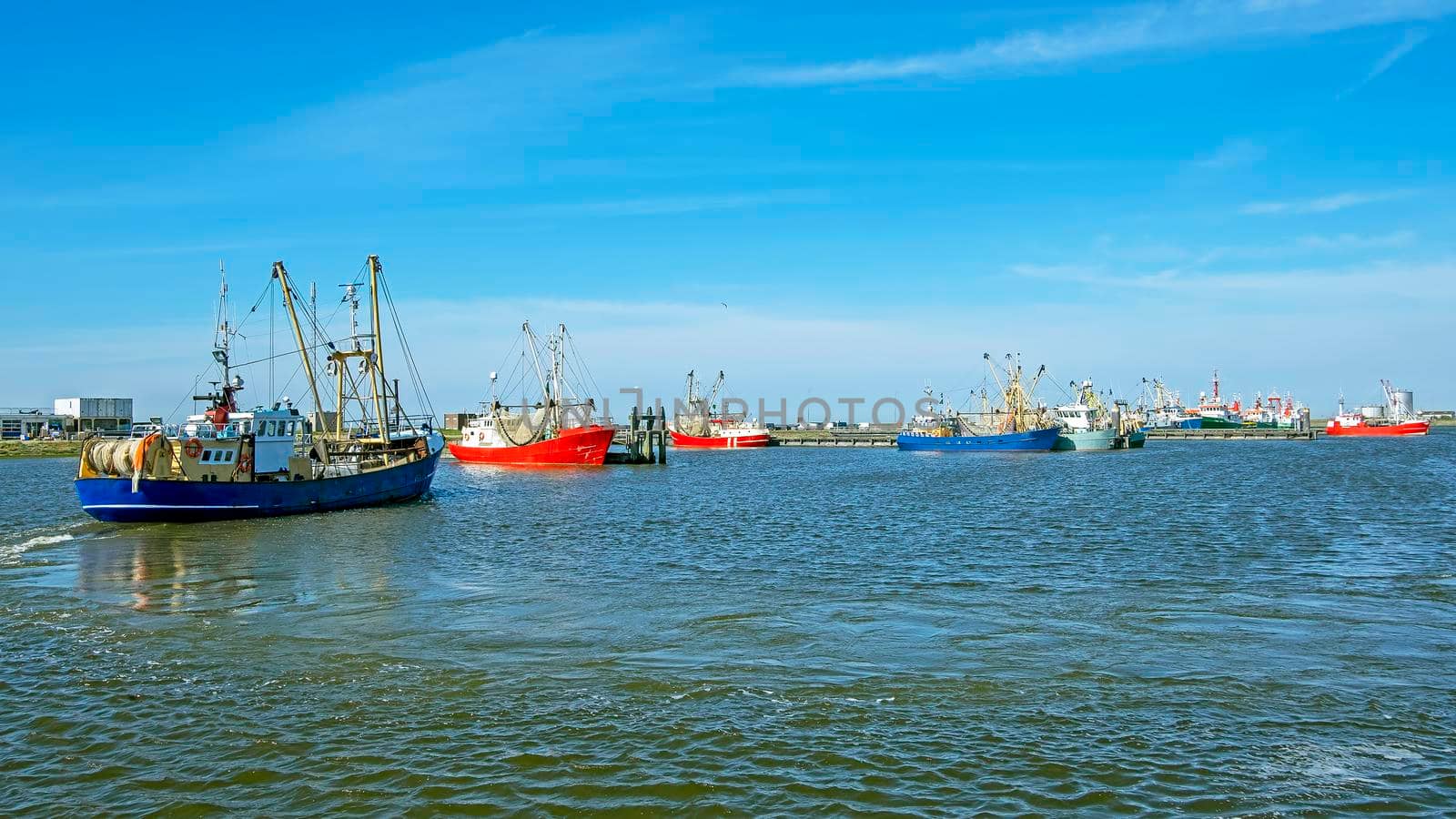 Fishing boats in the harbor from Lauwersoog in the Netherlands by devy