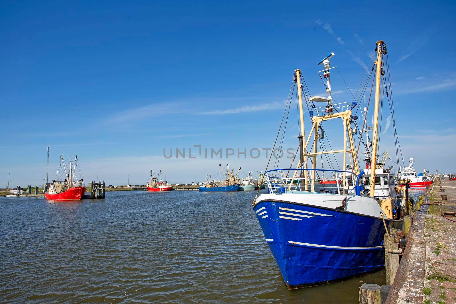Fishing boat in the harbor from Lauwersoog in the Netherlands
